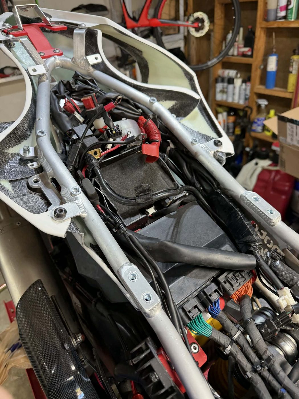 On the bike with the seat off